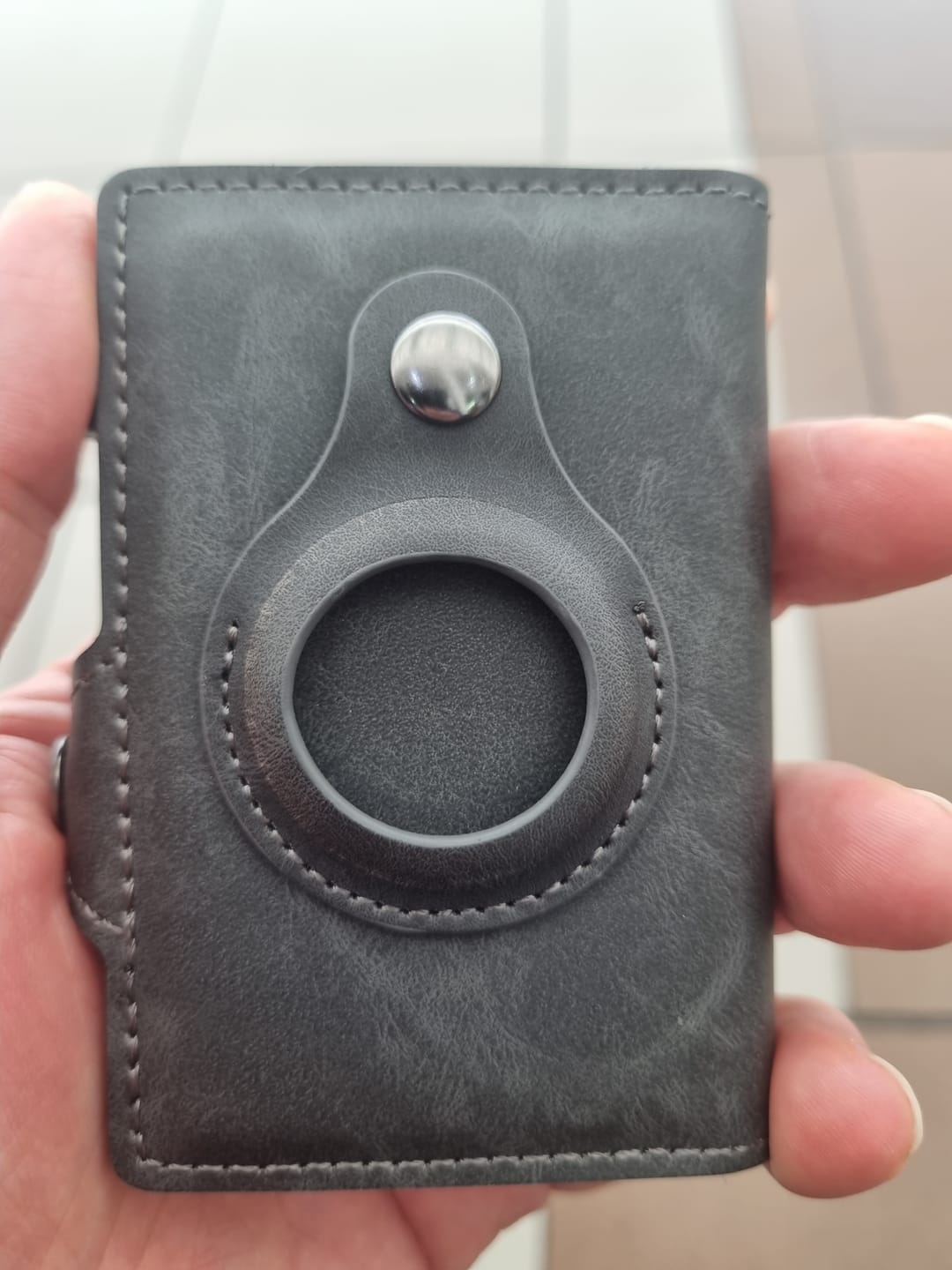 Customer photo review of Dark Grey Airtag
