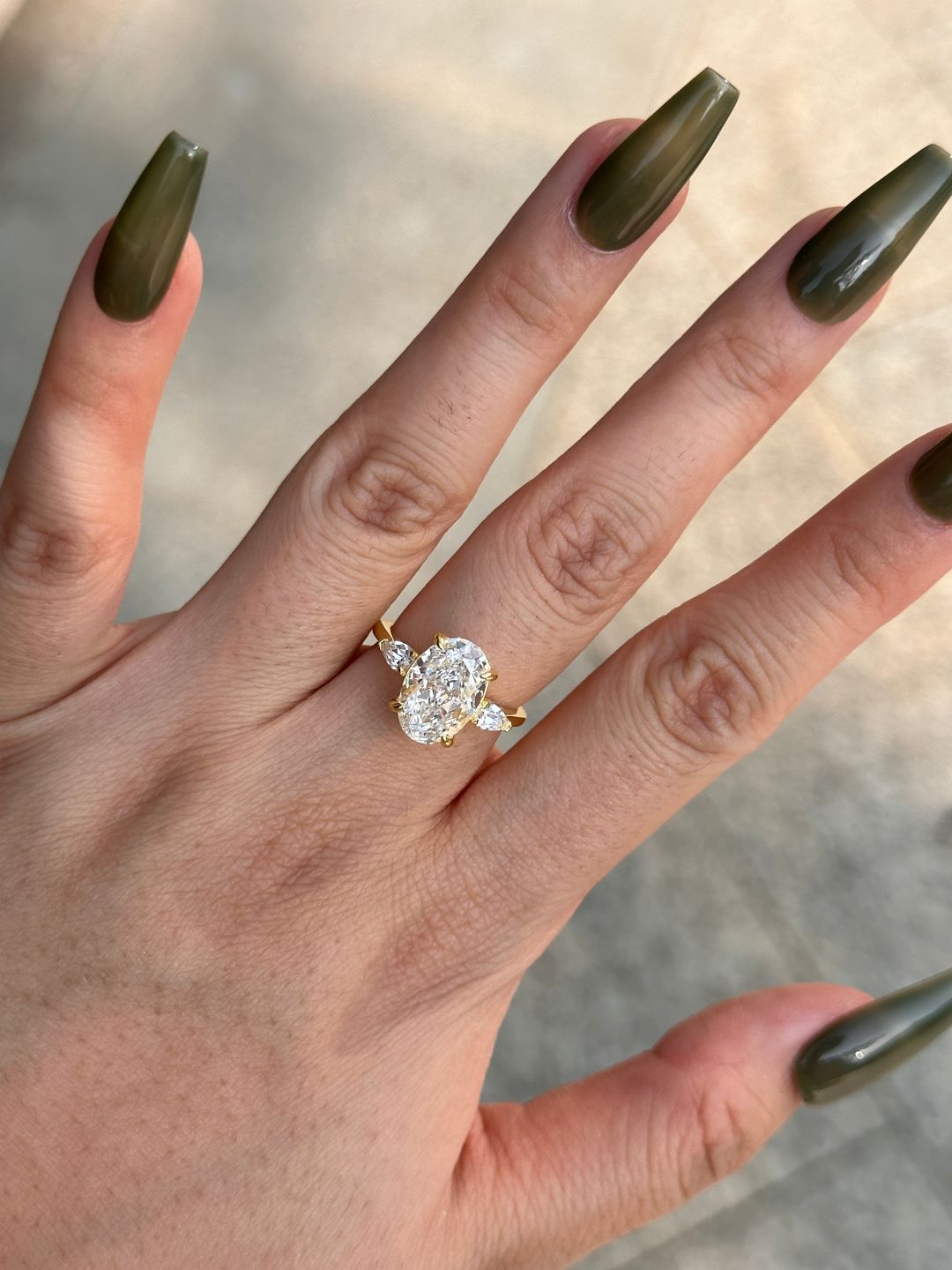 Customer photo review of Louily Outstanding Oval Cut Three Stone Engagement Ring