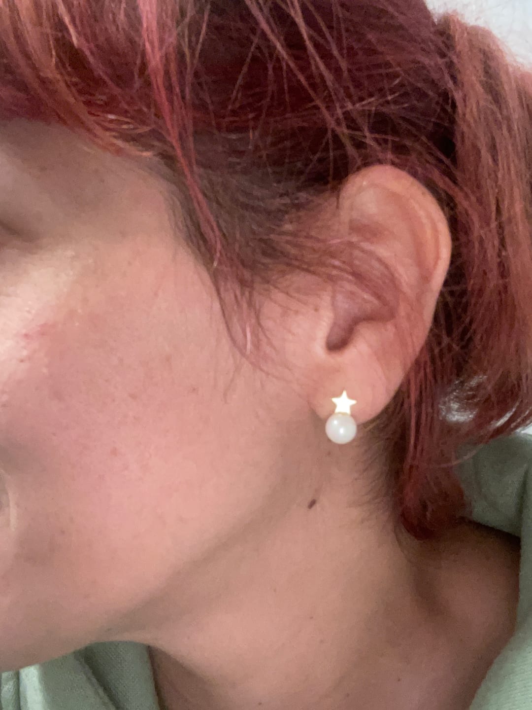 Customer photo review of Pendientes Plumas de Amor