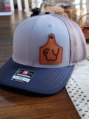 Customer photo review of Ear Tag Custom Leather Patch Trucker Hat - Richardson 112