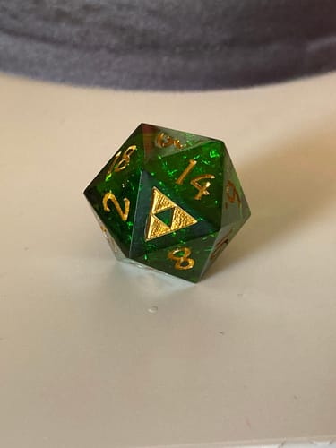 Customer photo review of Dark Green Glitter Resin All Zelda  DnD D&D Dice Set