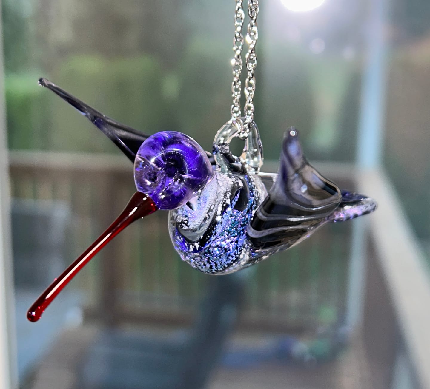 Customer photo review of Purple Dichroic Twist Glass Hummingbird with Infused Ash