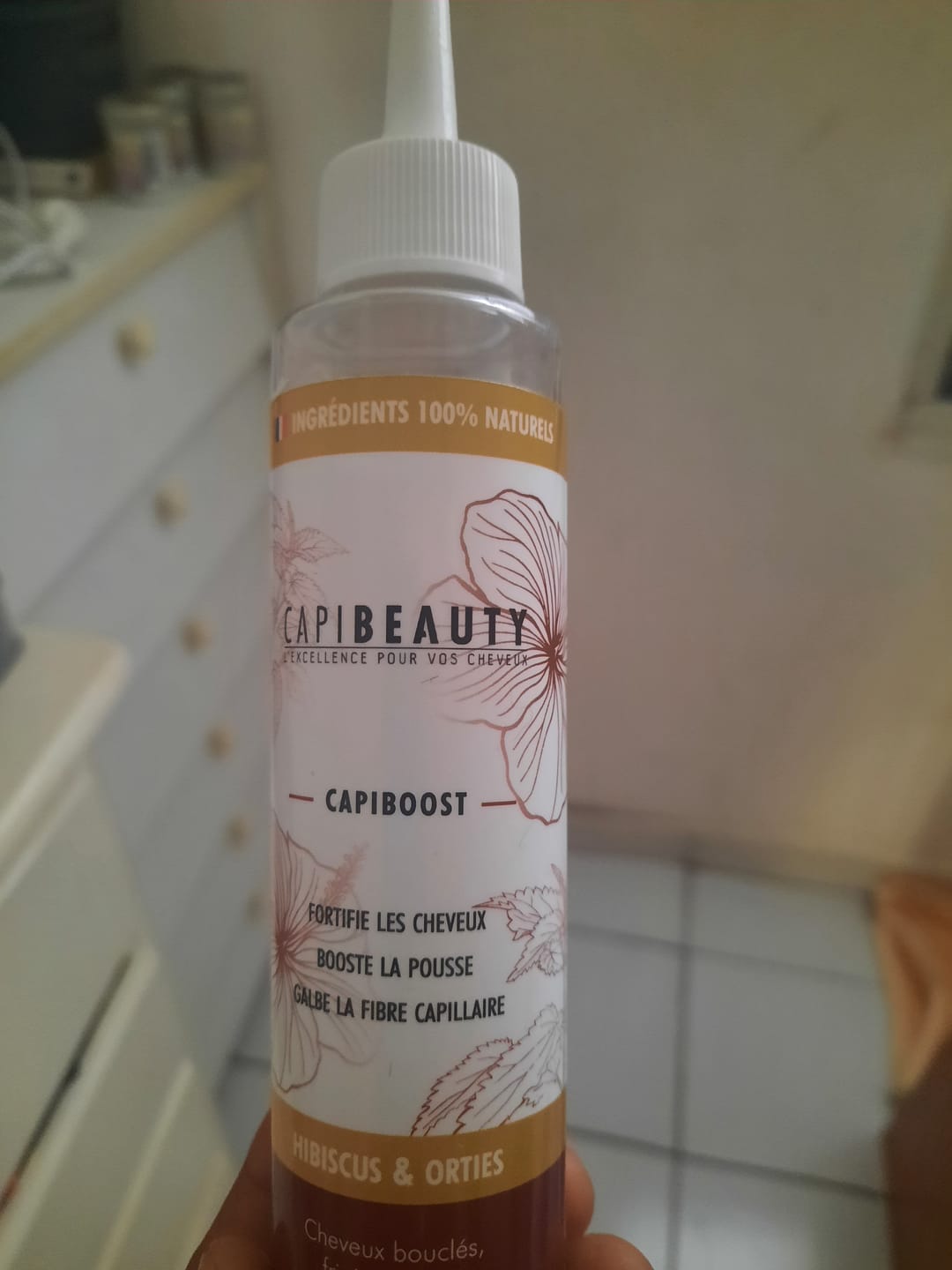 Customer photo review of Sérum Capiboost Hibiscus & Orties 120ml pour la pousse des cheveux bouclés frisés crépus