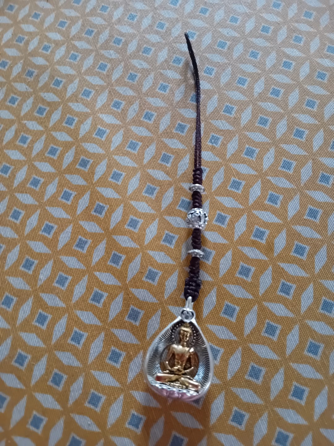 Customer photo review of Amulettes Bouddha