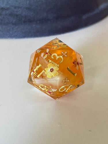 Customer photo review of Honey Bee and Flower Resin DnD D&D Dice Set