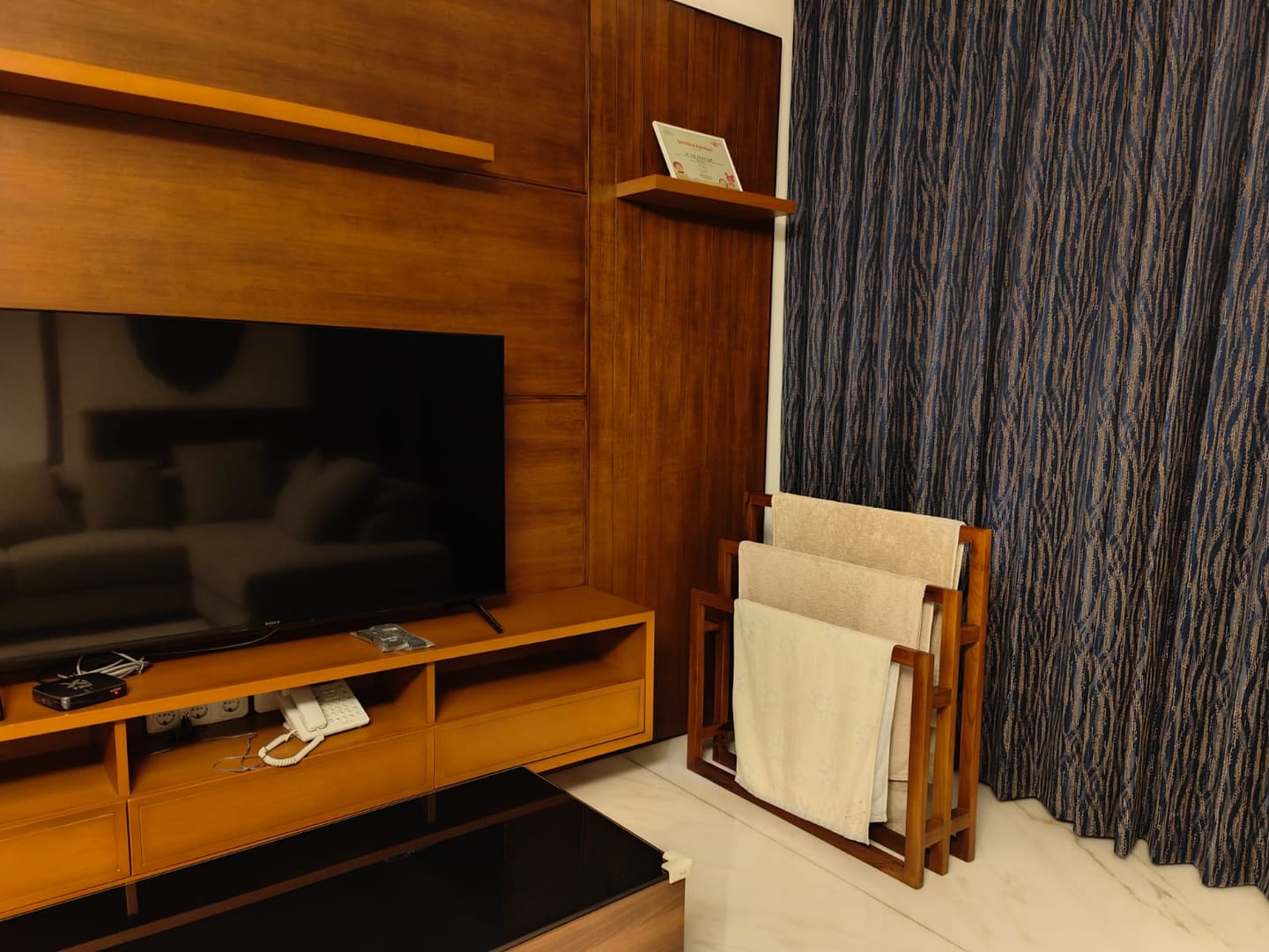 Customer photo review of Exclusive Tiered Teak Towel Rack