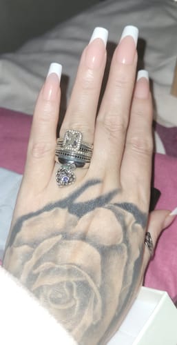 Customer photo review of Angel Heart Charm Ring with Tanzanite