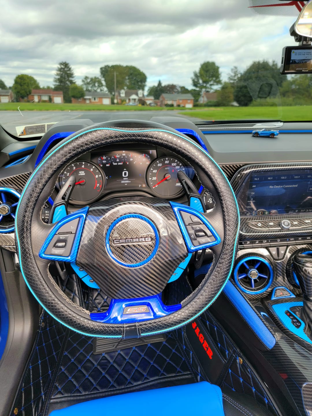 Customer photo review of 2016-2023 Chevy Camaro Real Carbon Fiber Interior Hazard Button Cover