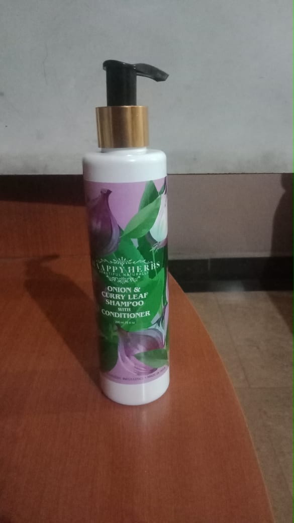 Customer photo review of Onion & Curry Leaf Shampoo With Conditioner