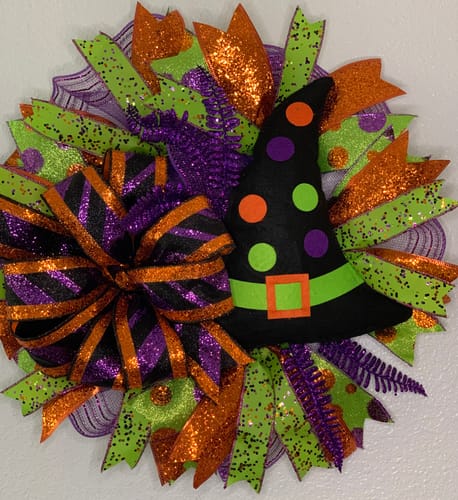 Customer photo review of 12.75"H Polka Dot Witch Hat Black/Lime Green/Orange HH736831