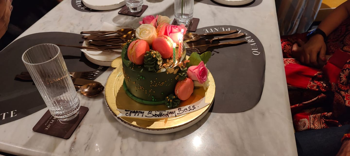 Customer photo review of Bottle Green Floral Cake