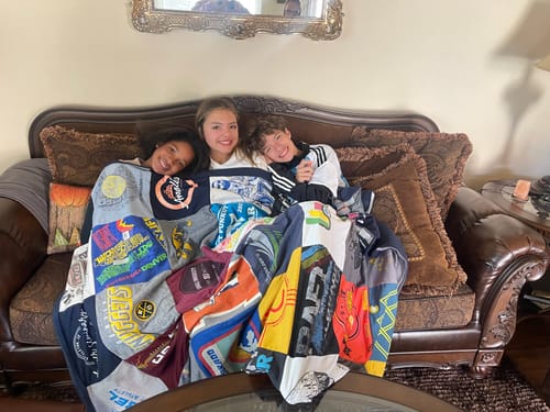 T-shirt quilt with sports, racing themes by jaime from CO