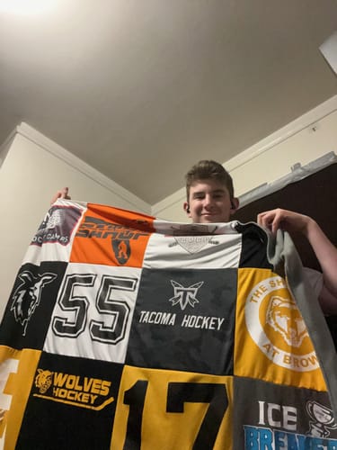 T-shirt quilt with hockey, sports themes by Colleen from MI