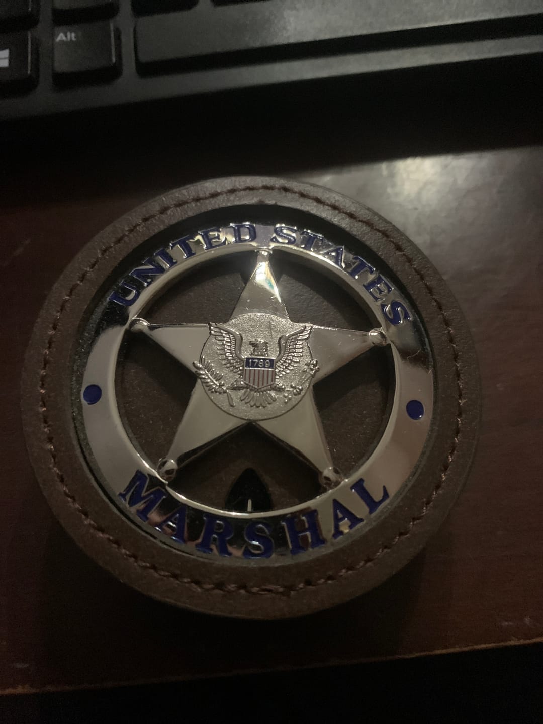 Customer photo review of US Federal Court Law Enforcement MARSHAL Badge Solid Copper Replica Movie Props