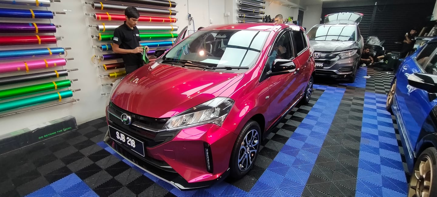 Customer photo review of Glossy Metallic Rubellite Purple Vinyl Wrap