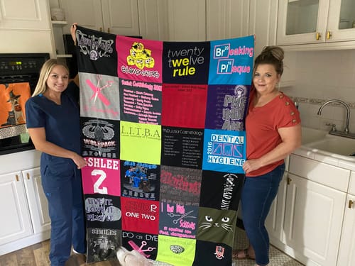 T-shirt quilt with dentistry, personal development themes by Misty from TX