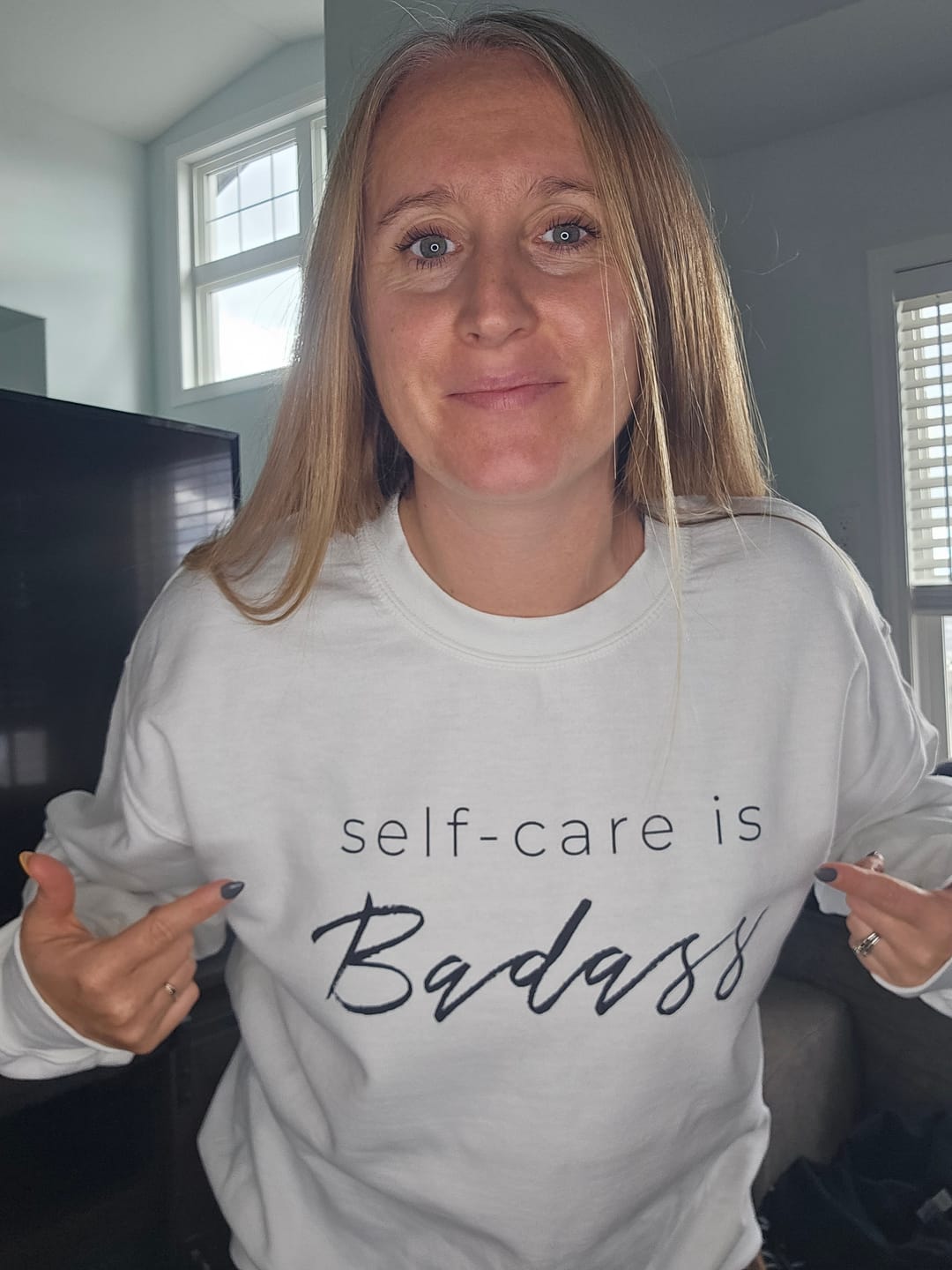 Customer photo review of Self-Care Is Badass Sweatshirt