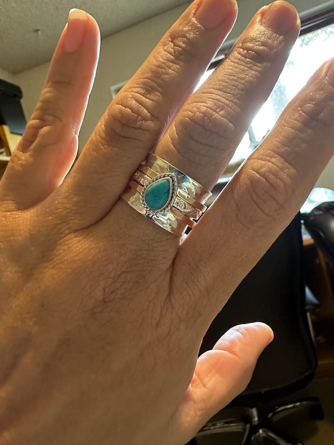 Customer photo review of Teardrop Turquoise Fidget Ring Sterling Silver
