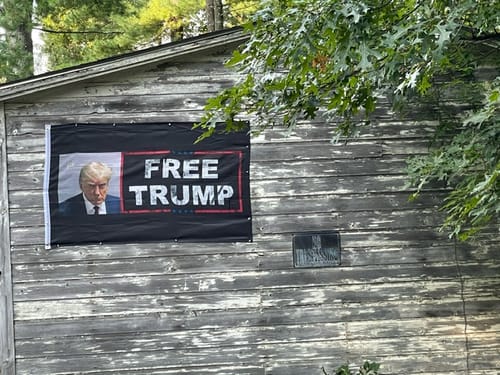 Customer photo review of Trump Mugshot Flag - 3'x5'