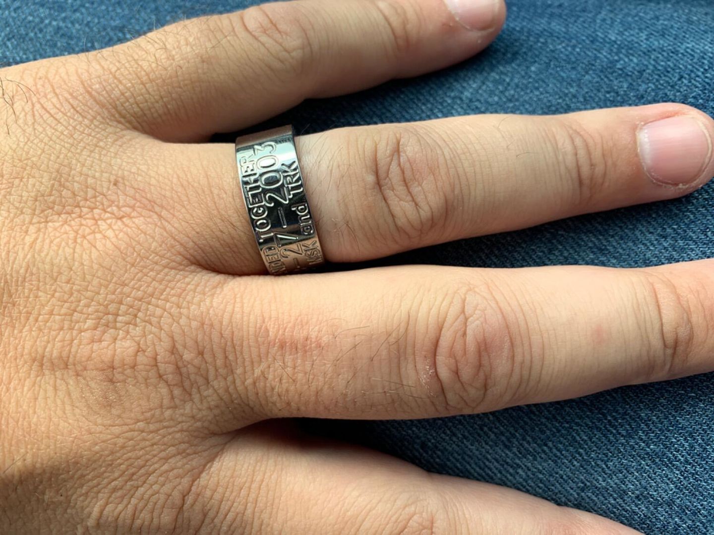 Customer photo review of Duck Band Wedding Ring - 10mm Titanium