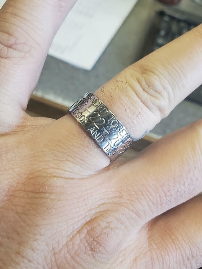 Customer photo review of Duck Band Wedding Ring - 10mm Titanium