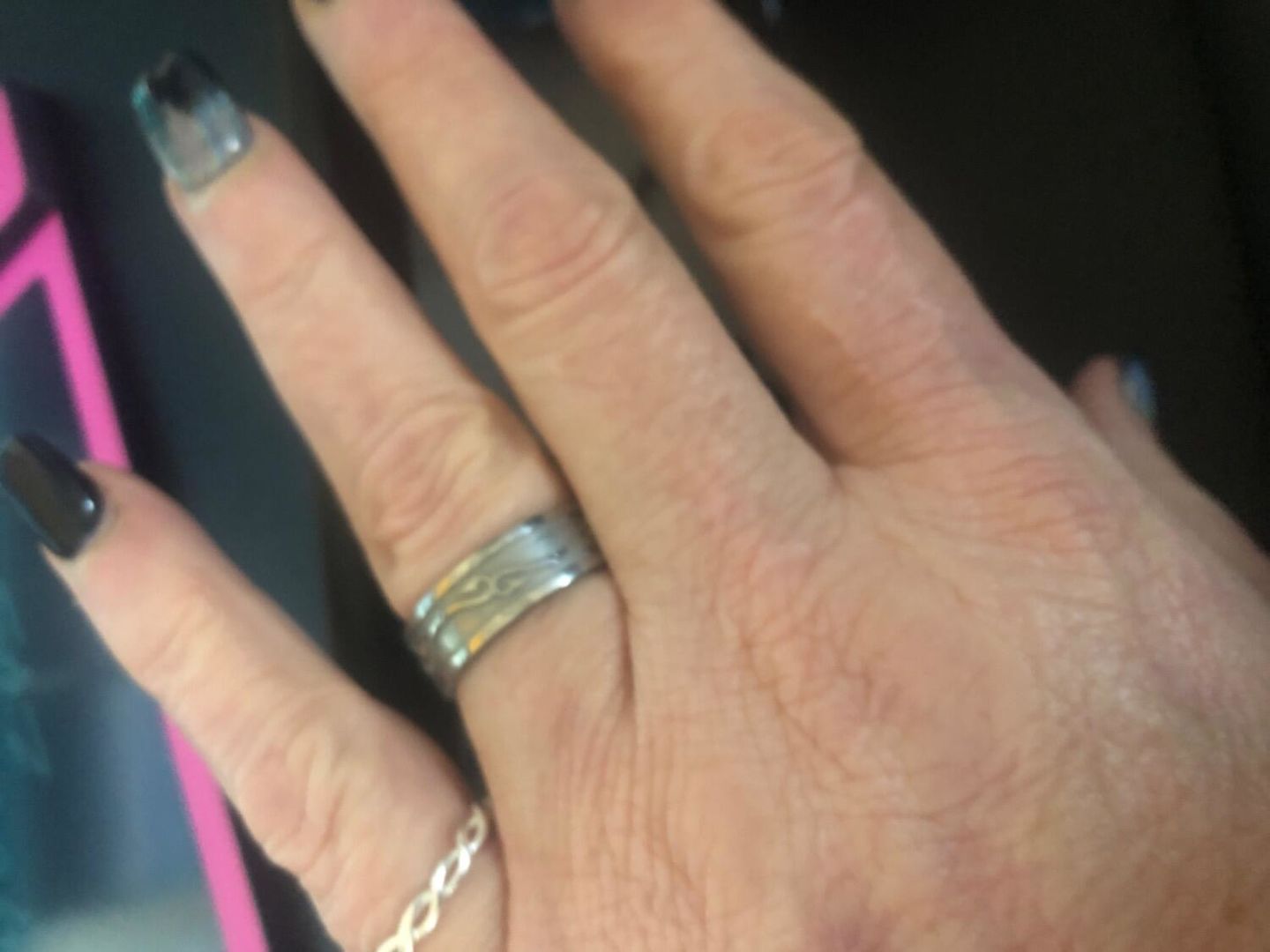 Customer photo review of Fish Hook Ring - Titanium 7mm