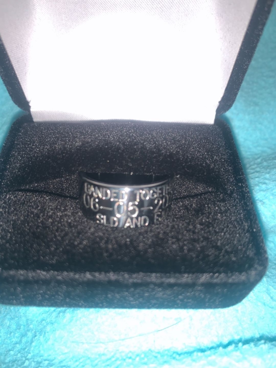 Customer photo review of Duck Band Wedding Ring - 10mm Titanium