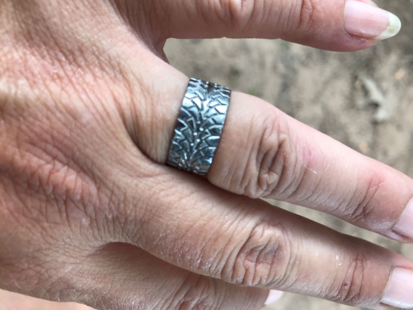 Customer photo review of Tire Wedding Ring - Titanium 9mm