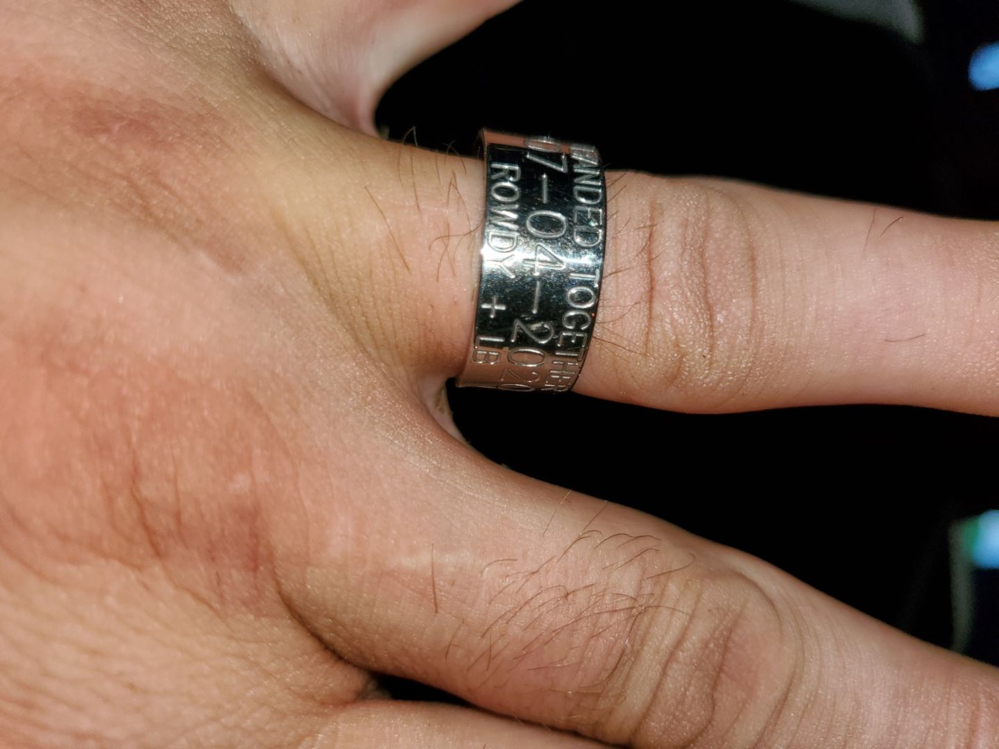 Customer photo review of Duck Band Wedding Ring - 10mm Titanium