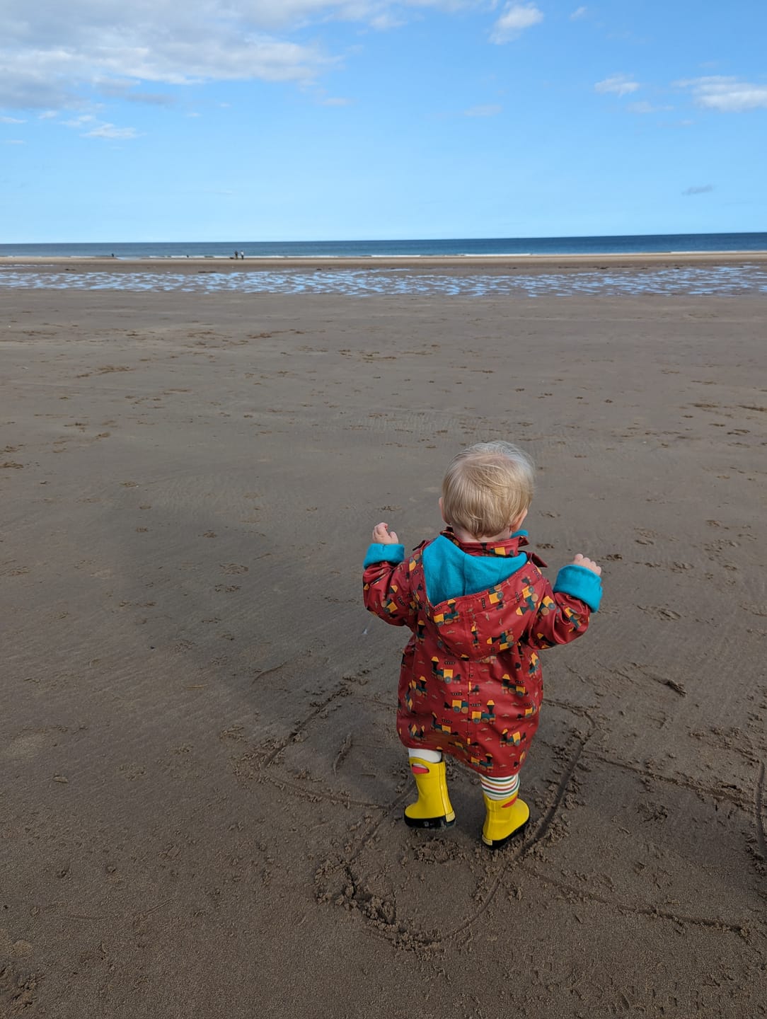 Customer photo review of Sky Train Waterproof Recycled Raincoat