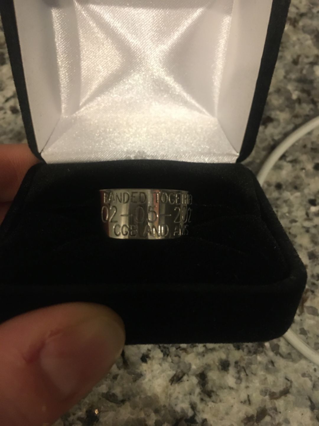 Customer photo review of Duck Band Wedding Ring - 10mm Titanium