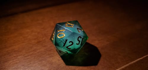Customer photo review of Green Liquid Core Resin Galaxy DnD D&D Dice Set