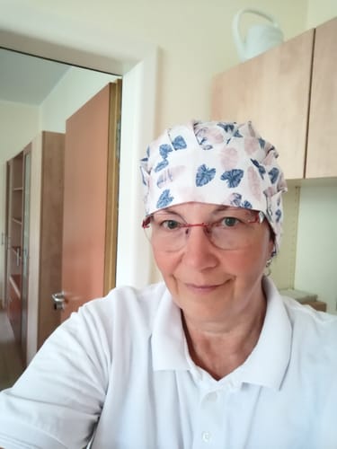 Customer photo review of Barett OP Haube Federn