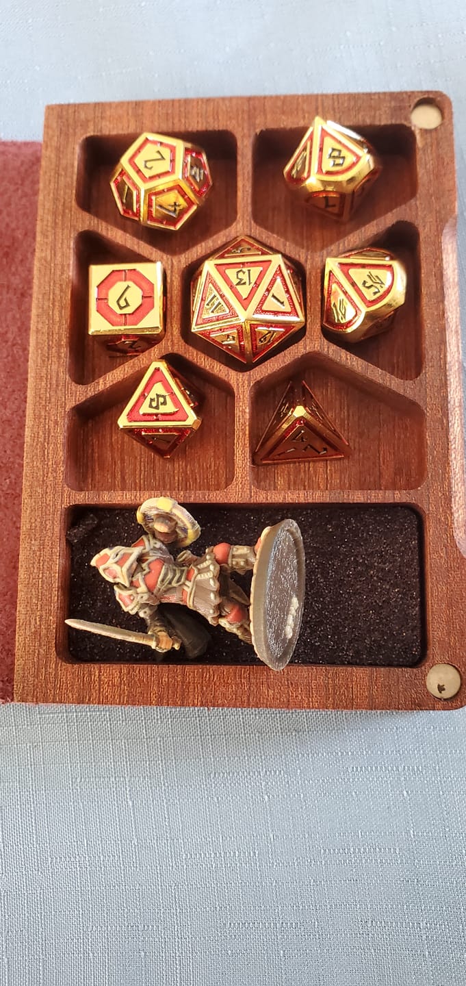Customer photo review of Cleric's Domain Red & Gold Metal Dice Set