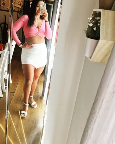 Customer photo review of Pink Twist Long Sleeve Crop Top
