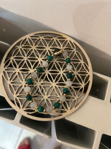 Customer photo review of Plaque de rechargement :  Fleur de vie sculptée en chêne 10cm
