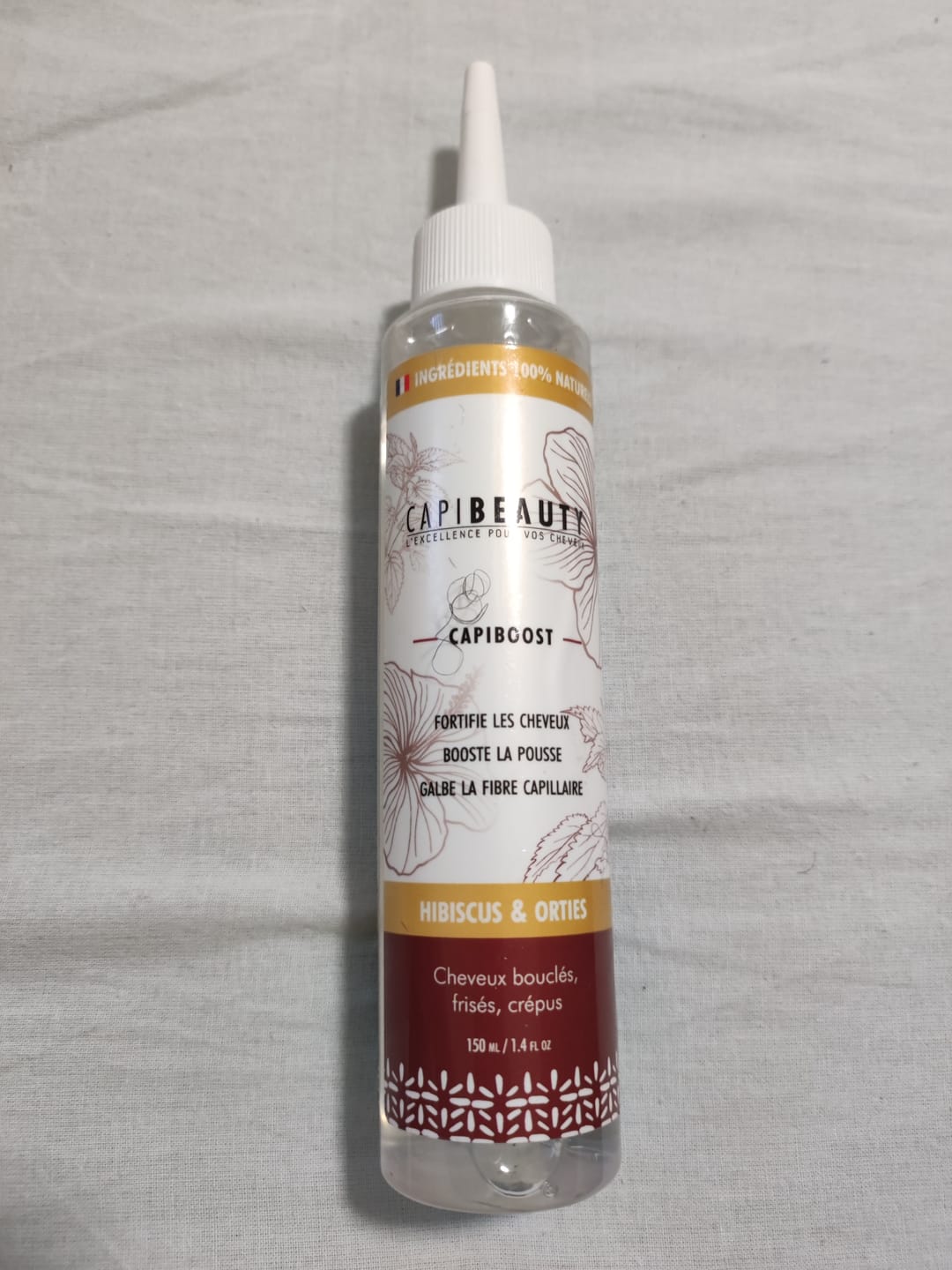 Customer photo review of Sérum Capiboost Hibiscus & Orties 120ml pour la pousse des cheveux bouclés frisés crépus
