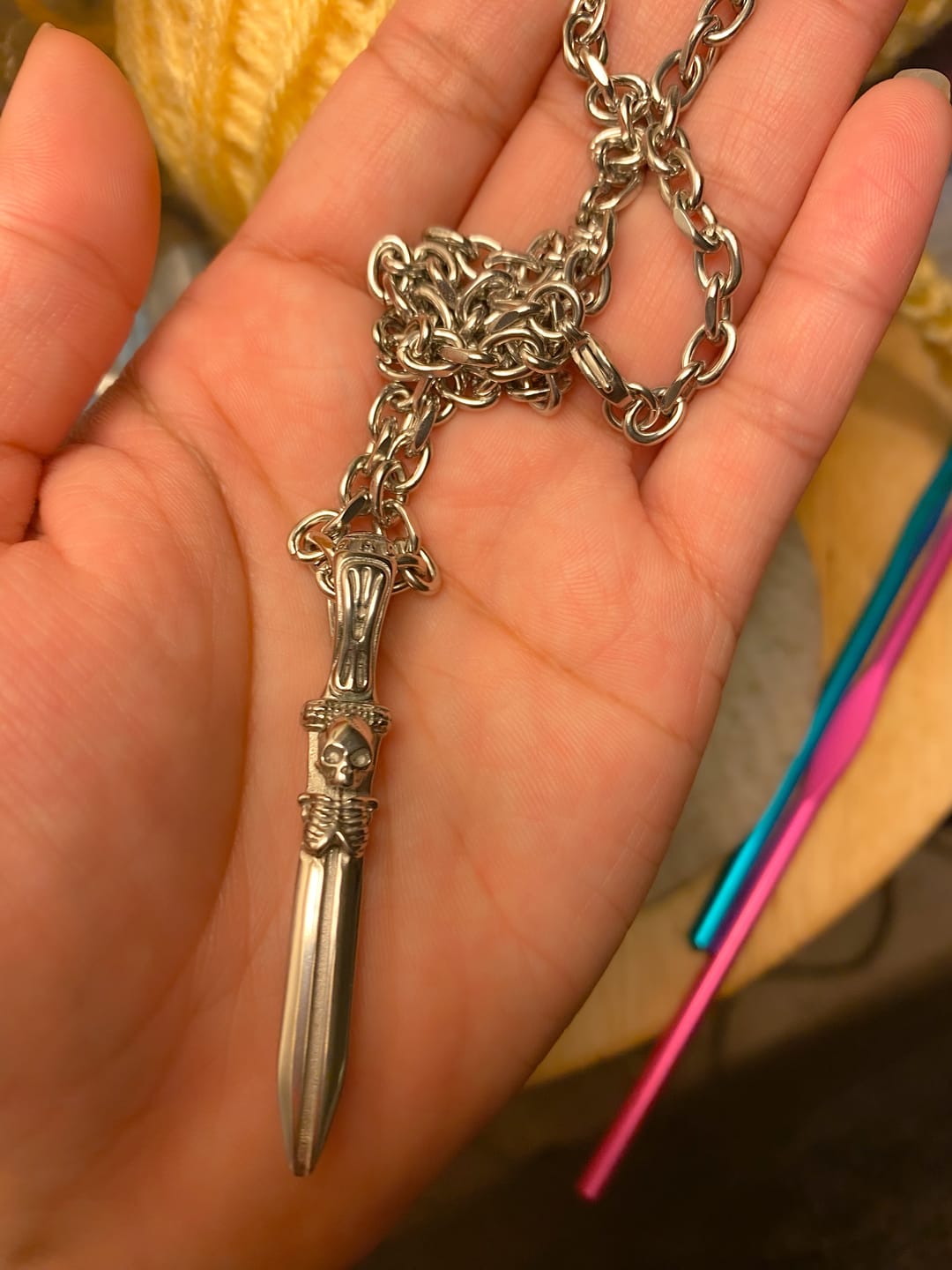 Customer photo review of CATACOMB SWORD PENDANT