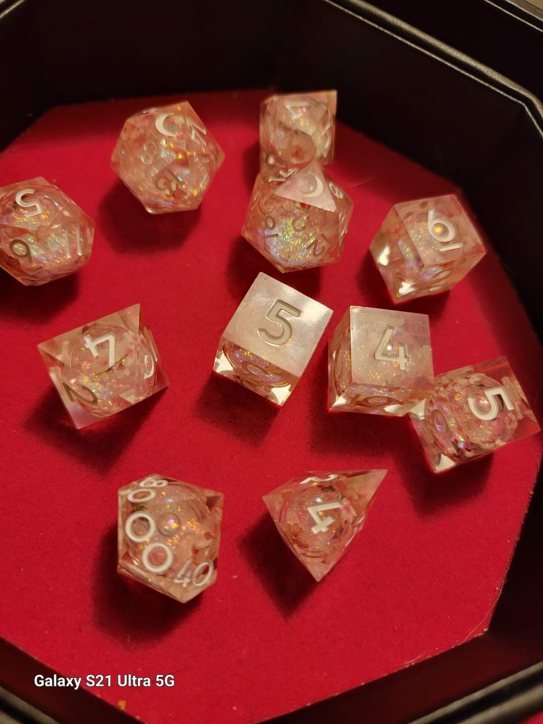 Customer photo review of URWizards D&D Liquid Core Resin Engraved Dice Set Sakura