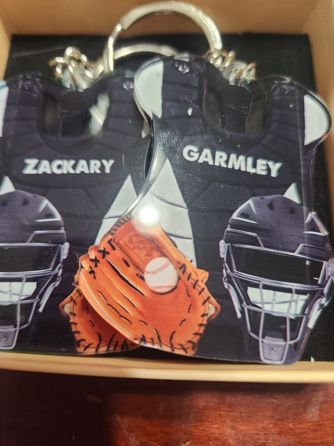 Customer photo review of Baseball Catcher Chest Protector and Helmet Acrylic Keychain