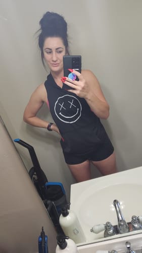 Customer photo review of Salty Savage Unisex “OG Smile” Sleeveless Racerback Muscle Tank Hoodie| Mix Up | Black/White