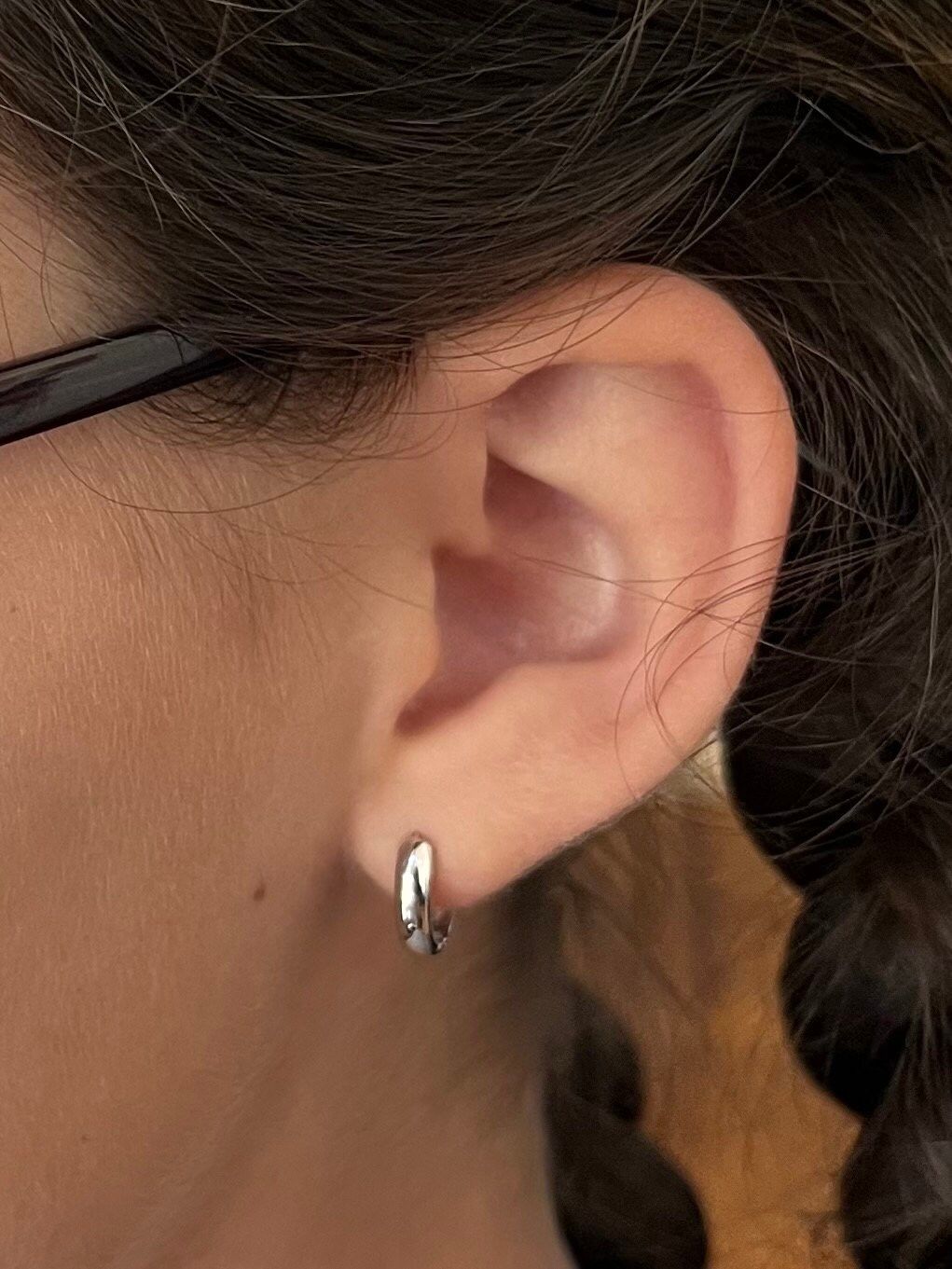 Customer photo review of Wide Dome Huggie Hoop Earrings, Solid 14K Gold