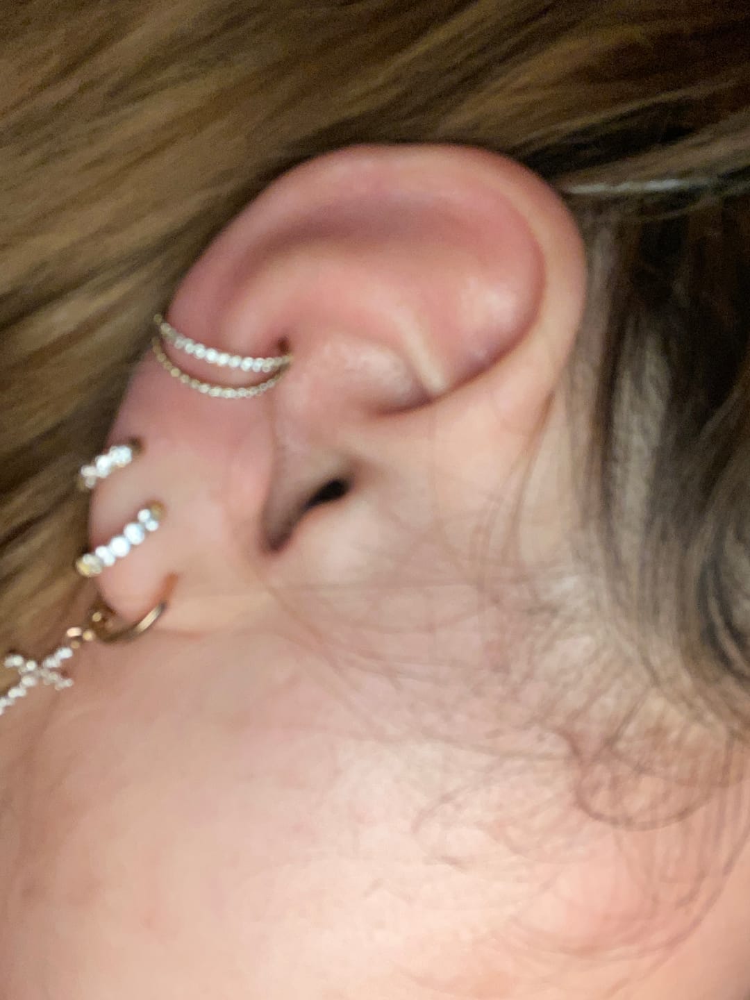 Customer photo review of Double Clicker Piercing | Titan