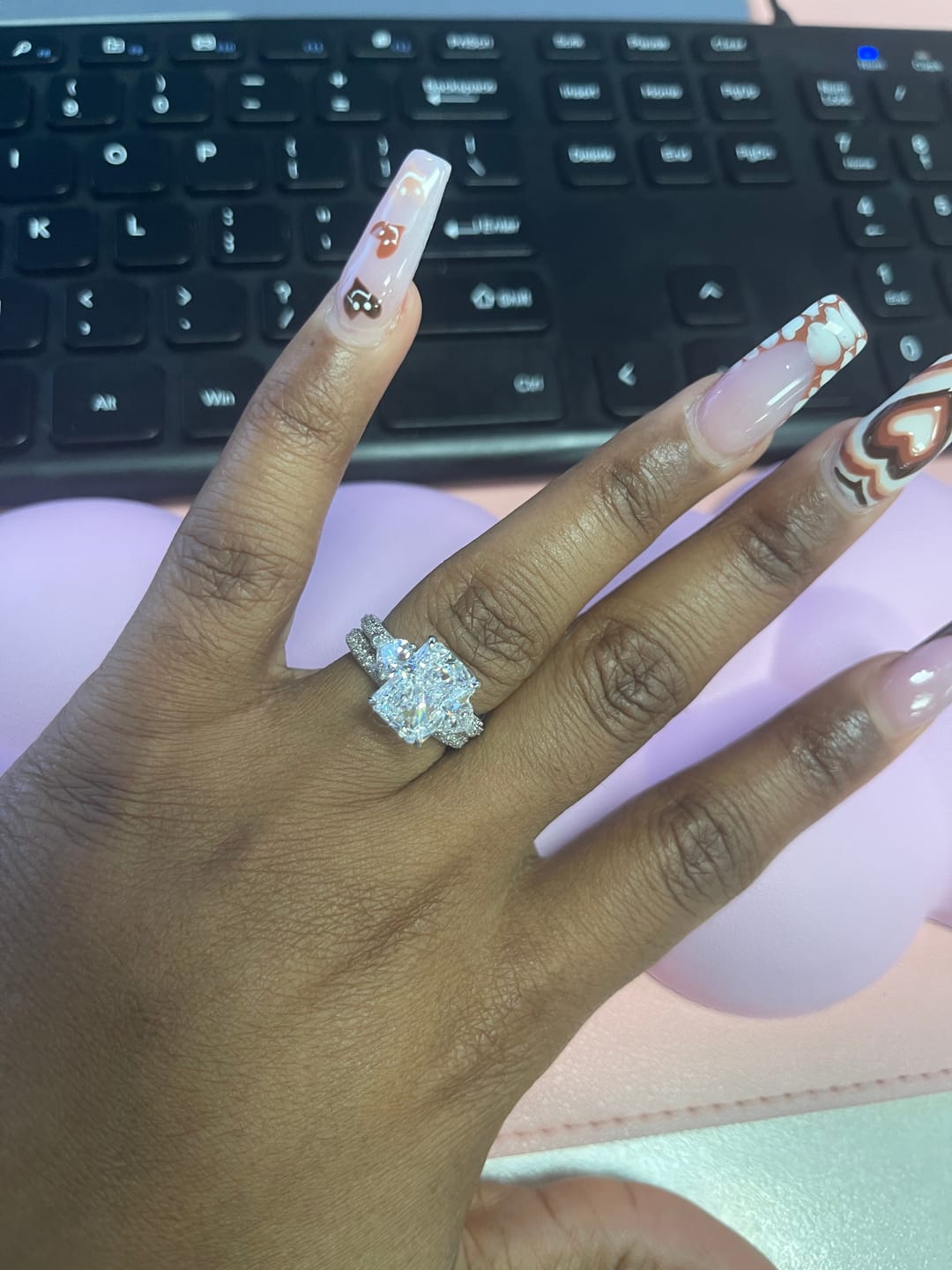 Customer photo review of S925 5.0Ct Radiant Cut & Heart Cut Three Stone Wedding Set In Sterling Silver