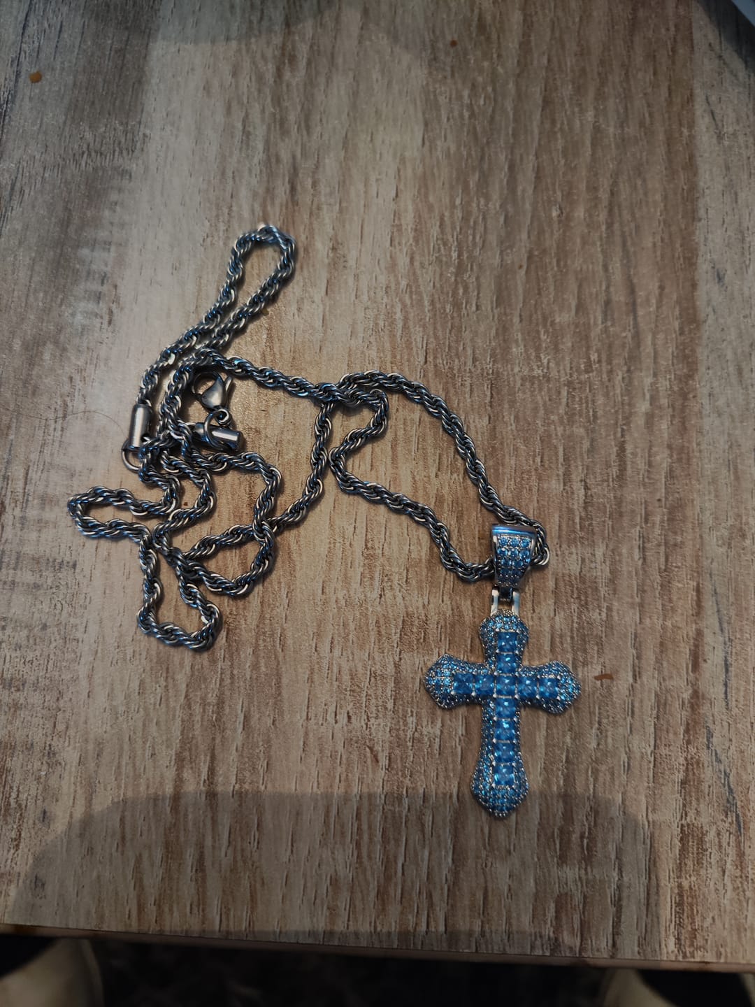 Customer photo review of BLUE CROSS PENDANT. - WHITE GOLD