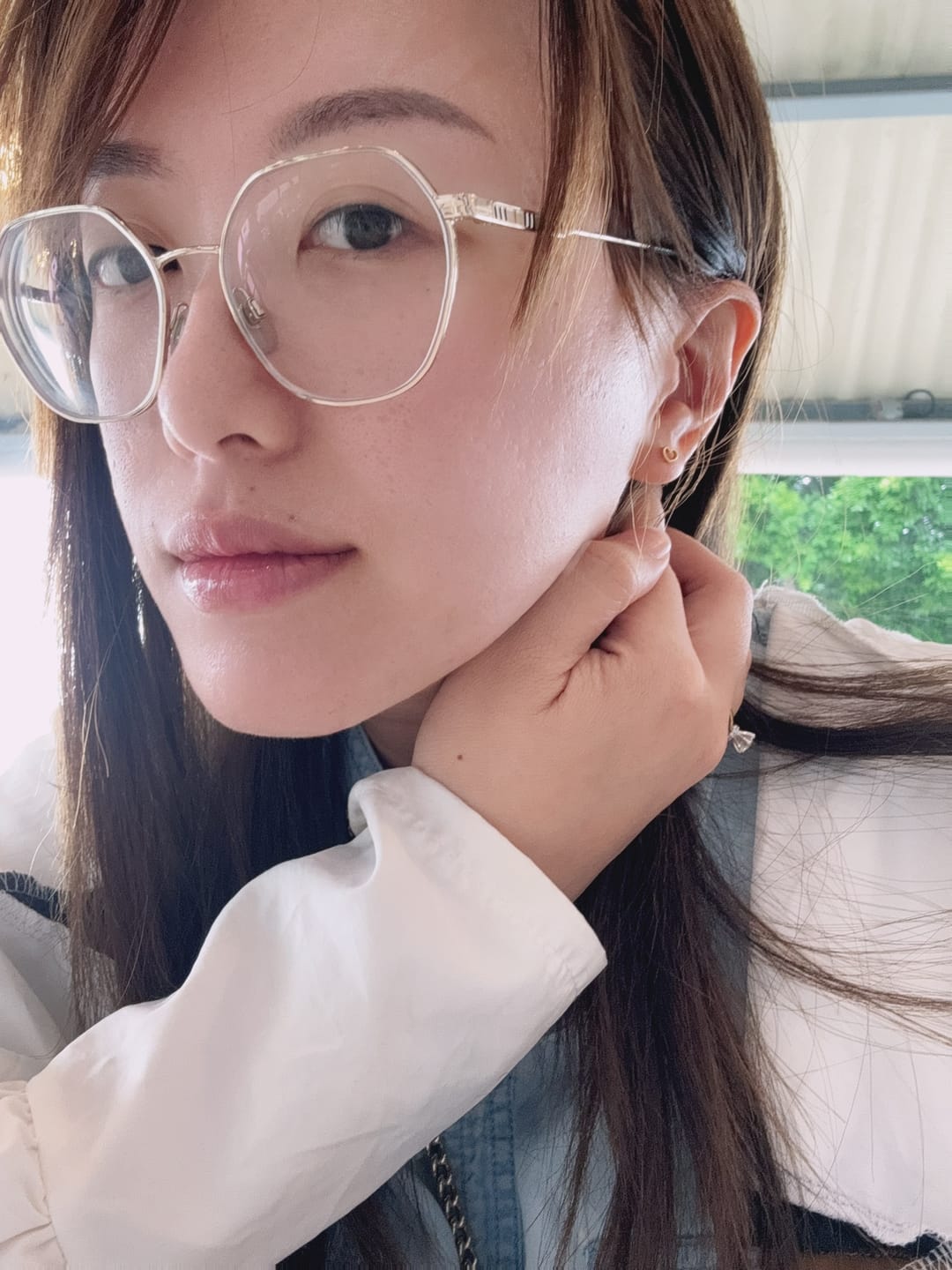 Customer photo review of Mini Heart Stud Earrings