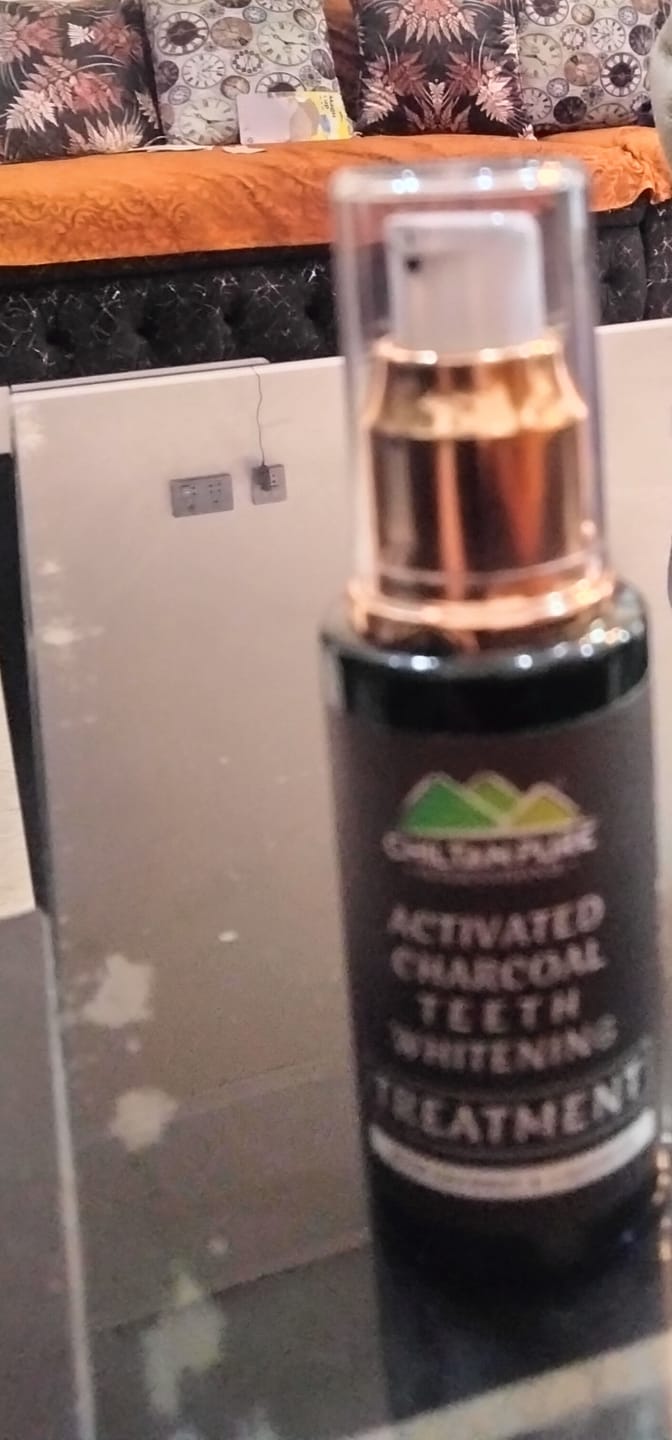 Customer photo review of Activated Charcoal Teeth 🦷 Whitening Treatment - Whitens Teeth Naturally, Kills Cavity causing Bacteria & Eliminates Bad Breath