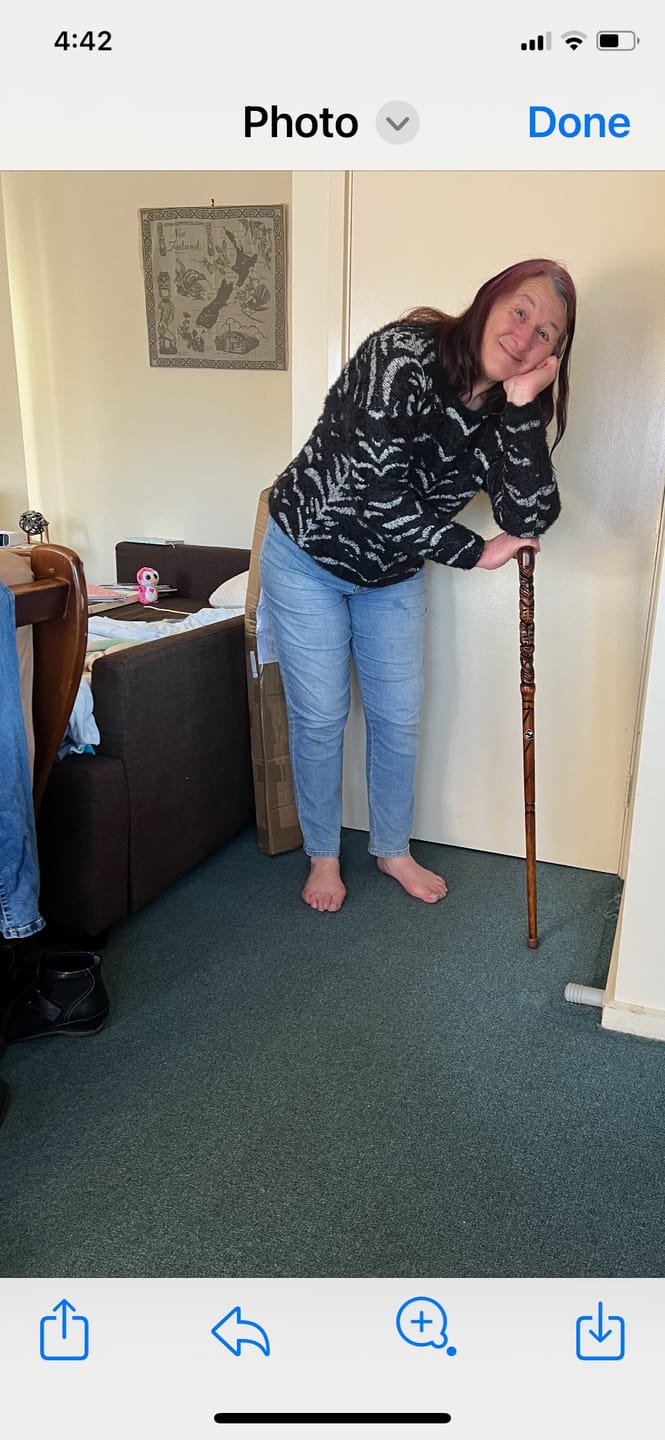 Customer photo review of Maori Walking Stick with Curved Handle and Tiki Carving