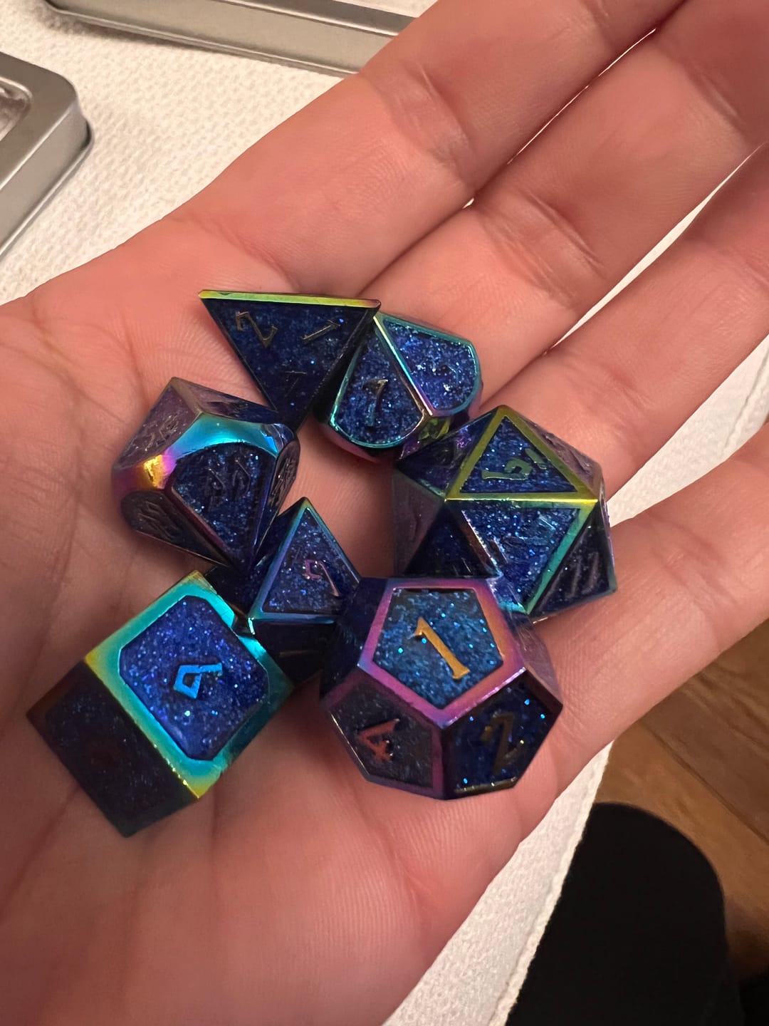Customer photo review of Elder Runes Iridescent And Blue Glitter Metal Dice Set