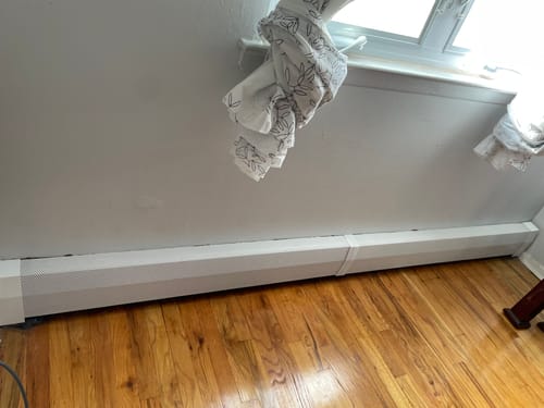 Customer photo review of EZ Snap Covers Standard Height 7 1/2" White Baseboard Heater Cover Kit with 2 Closed End Caps